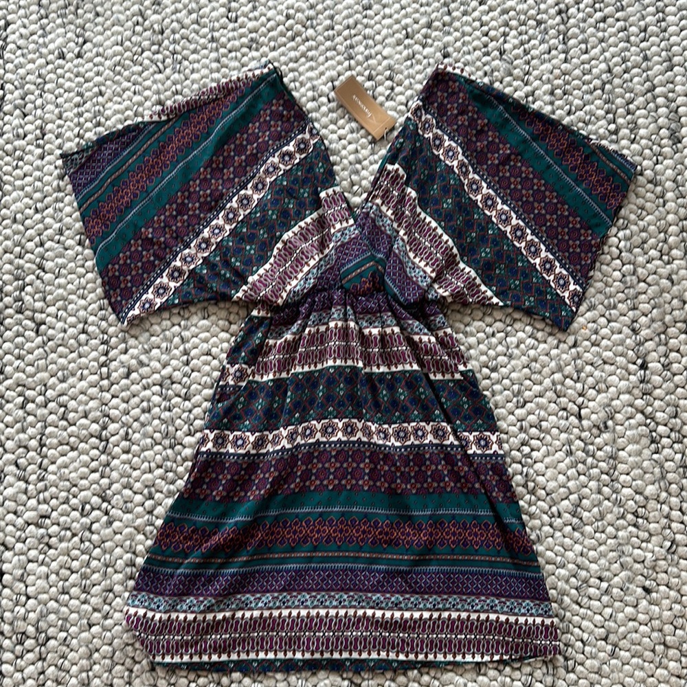 Francesca’s V-Neck blouse. New with tags!